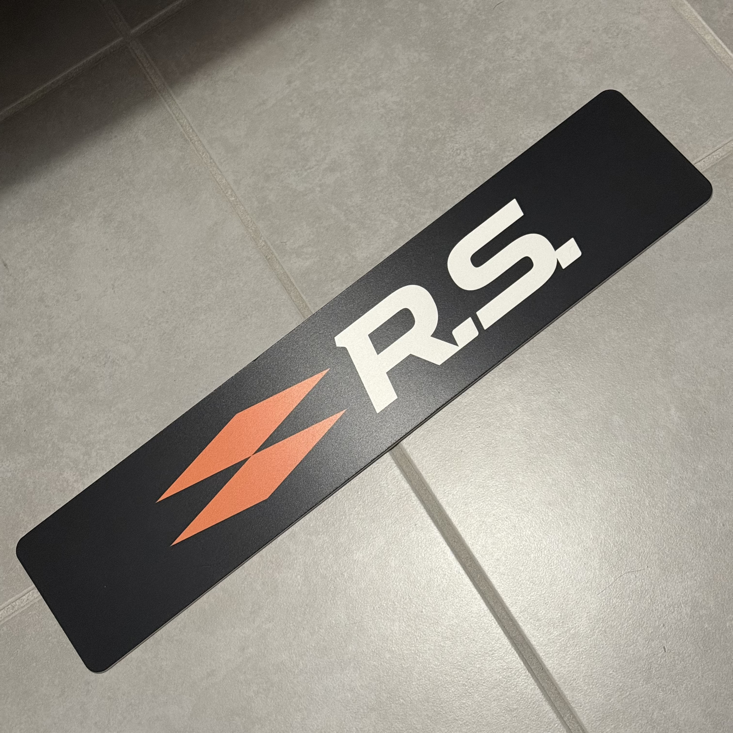Cache Plaque "RS PERFORMANCE" Noir/Orange